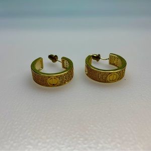 Gold color cycle earrings